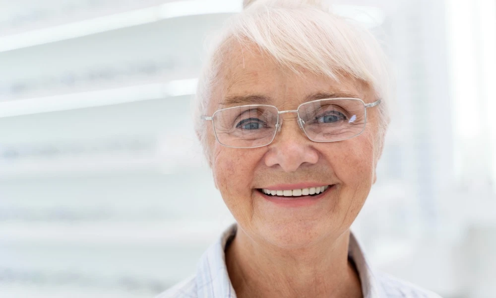 Photo of elder Woman with Implant retained Bridge